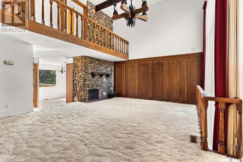 54 Lowry Place, Regina, SK - Indoor Photo Showing Other Room With Fireplace