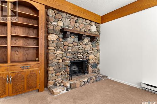 54 Lowry Place, Regina, SK - Indoor With Fireplace