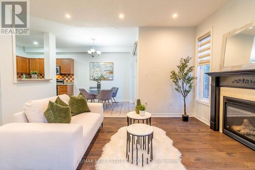 73 Pantomine Boulevard, Brampton, ON - Indoor Photo Showing Living Room With Fireplace