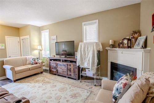 20 Springstead Avenue, Hamilton, ON - Indoor Photo Showing Living Room With Fireplace