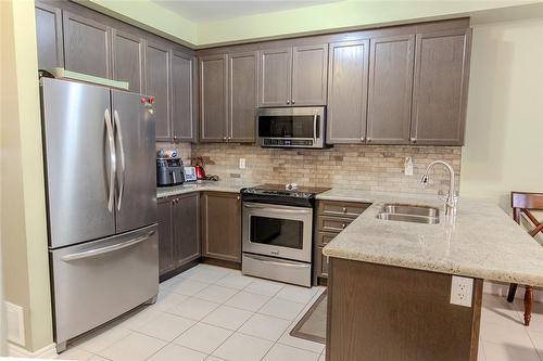 20 Springstead Avenue, Hamilton, ON - Indoor Photo Showing Kitchen With Stainless Steel Kitchen With Double Sink With Upgraded Kitchen