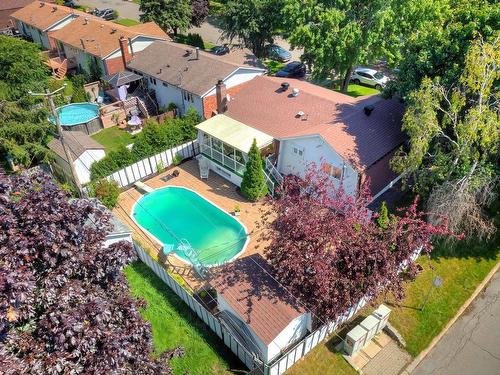 Cour - 7500 Rue Thibault, Brossard, QC - Outdoor With Above Ground Pool With View