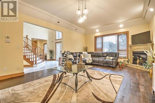 2600 Chick Court, Windsor, ON - Indoor Photo Showing Living Room With Fireplace