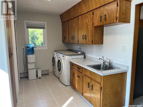 Pohler Acreage, Spalding, SK - Indoor Photo Showing Laundry Room