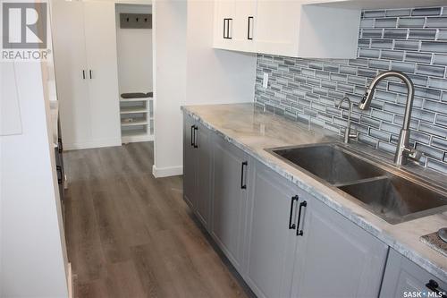 506 4045 Rae Street, Regina, SK - Indoor Photo Showing Kitchen With Double Sink