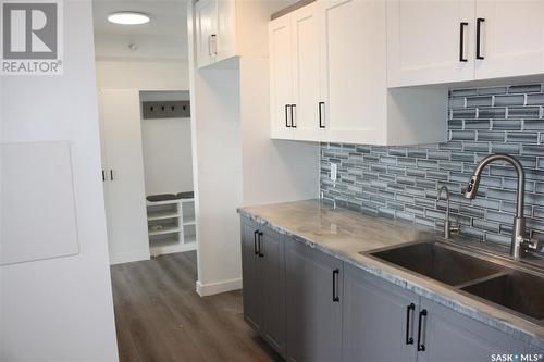 506 4045 Rae Street, Regina, SK - Indoor Photo Showing Kitchen With Double Sink