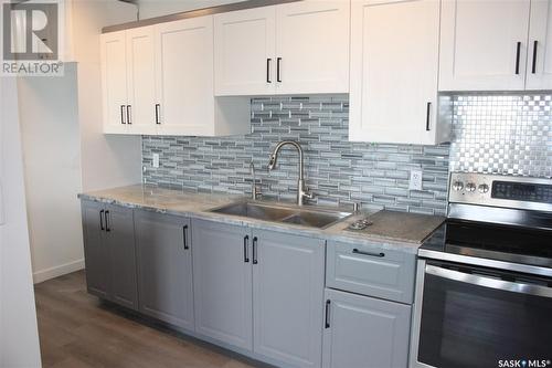 506 4045 Rae Street, Regina, SK - Indoor Photo Showing Kitchen With Double Sink With Upgraded Kitchen