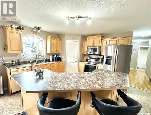 10305 Bunce Crescent, North Battleford, SK - Indoor Photo Showing Kitchen With Double Sink