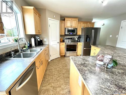 10305 Bunce Crescent, North Battleford, SK - Indoor Photo Showing Kitchen With Double Sink