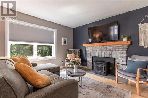 93 Burlington Avenue, Moncton, NB - Indoor Photo Showing Living Room With Fireplace