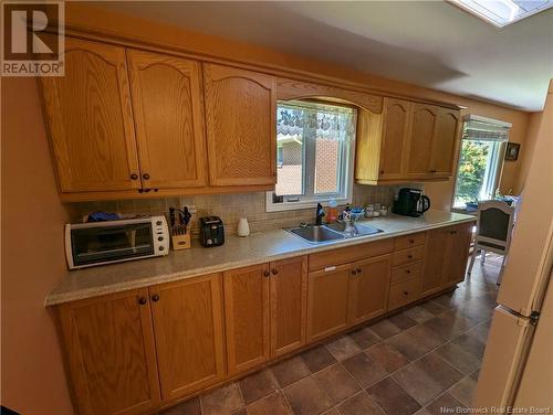 26 Melanson, Bathurst, NB - Indoor Photo Showing Kitchen With Double Sink