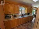 26 Melanson, Bathurst, NB  - Indoor Photo Showing Kitchen With Double Sink 