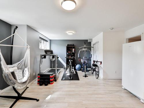 Salle familiale - 118 Rue Des Cuivres, Saint-Colomban, QC - Indoor Photo Showing Gym Room