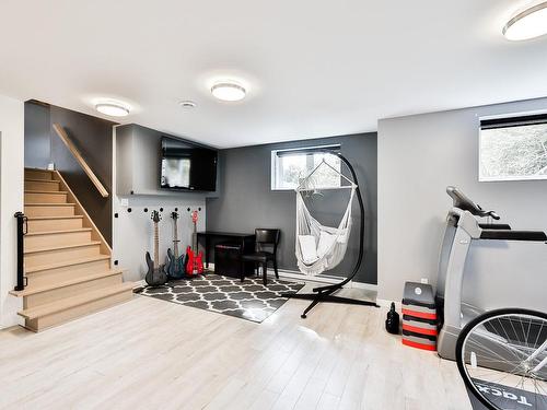 Salle familiale - 118 Rue Des Cuivres, Saint-Colomban, QC - Indoor Photo Showing Gym Room