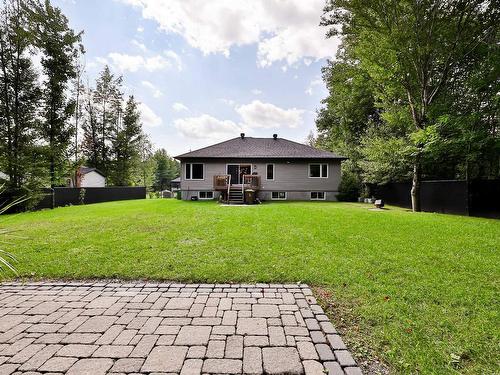 Cour - 118 Rue Des Cuivres, Saint-Colomban, QC - Outdoor With Deck Patio Veranda With Backyard