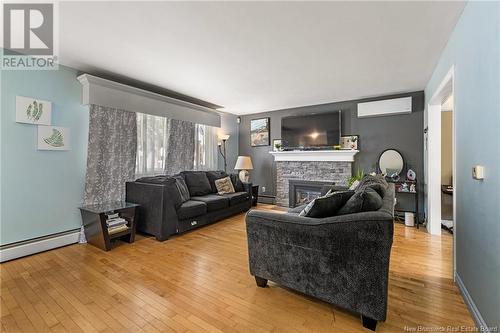 24 Anne, Moncton, NB - Indoor Photo Showing Living Room With Fireplace