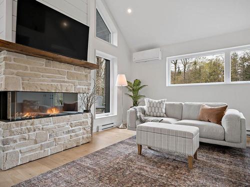 Living room - 198 Ch. Des Randonneurs, La Conception, QC - Indoor Photo Showing Living Room With Fireplace