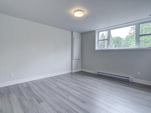 Master bedroom - 100 12E Avenue, Saint-Hippolyte, QC - Indoor Photo Showing Other Room