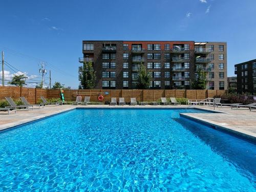 Pool - 307-3167 Boul. De La Gare, Vaudreuil-Dorion, QC - Outdoor With In Ground Pool