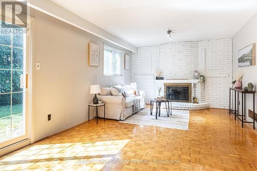 15 Riant Street, Toronto (Scarborough Village), ON - Indoor Photo Showing Living Room With Fireplace