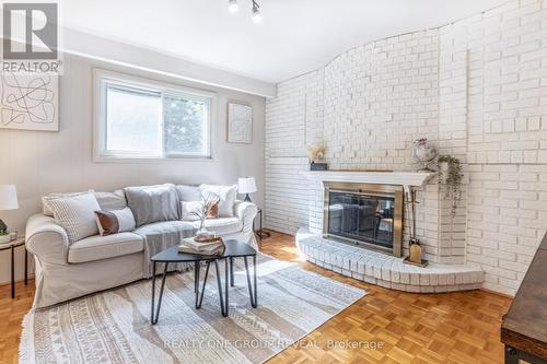 15 Riant Street, Toronto (Scarborough Village), ON - Indoor Photo Showing Living Room With Fireplace