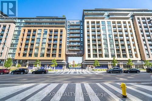 813 - 100 Eagle Rock Way, Vaughan, ON - Outdoor With Balcony With Facade