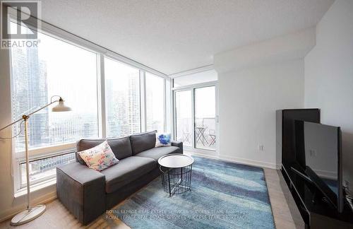 1305 - 10 York Street, Toronto, ON - Indoor Photo Showing Living Room