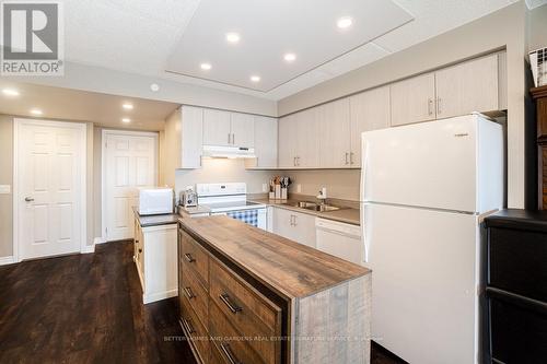 907 - 716 Main Street E, Milton, ON - Indoor Photo Showing Kitchen With Double Sink