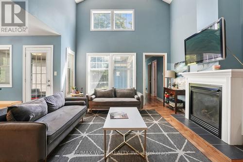 11 Rosemary Road, Tiny, ON - Indoor Photo Showing Living Room With Fireplace