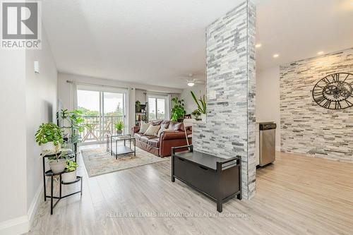 305 - 276 Eiwo Court, Waterloo, ON - Indoor Photo Showing Living Room