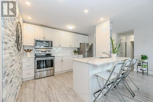 305 - 276 Eiwo Court, Waterloo, ON - Indoor Photo Showing Kitchen With Upgraded Kitchen