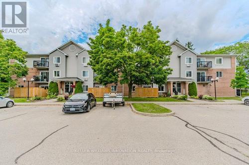 305 - 276 Eiwo Court, Waterloo, ON - Outdoor With Balcony With Facade