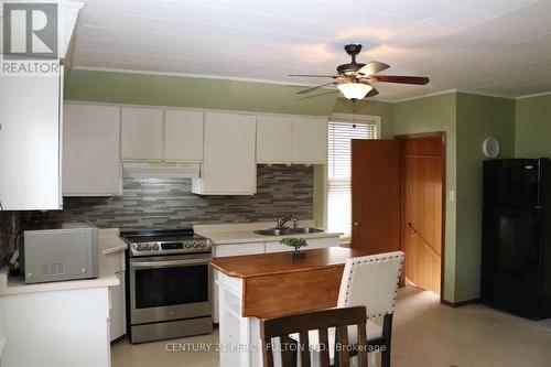 5991 Culp Street, Niagara Falls, ON - Indoor Photo Showing Kitchen With Double Sink