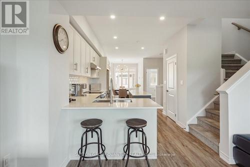 7 - 314 Equestrian Way, Cambridge, ON - Indoor Photo Showing Kitchen With Double Sink