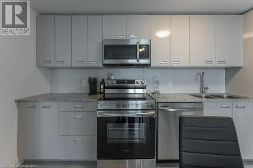 652 Princess Street Unit# 925, Kingston, ON - Indoor Photo Showing Kitchen With Double Sink