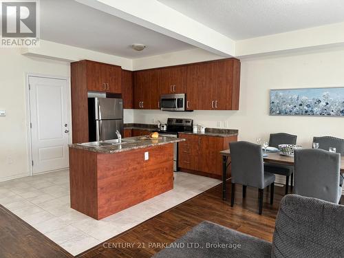 128 Berkshire Drive, Wellington North, ON - Indoor Photo Showing Kitchen With Double Sink