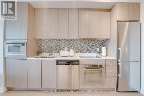 A527 - 5230 Dundas Street, Burlington (Orchard), ON - Indoor Photo Showing Kitchen With Double Sink