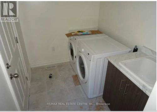 23 Little Britain Crescent, Brampton, ON - Indoor Photo Showing Laundry Room