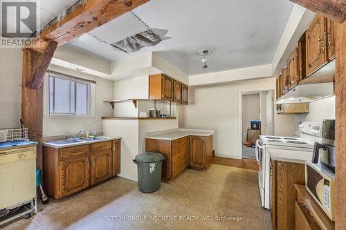 1213 Bayfield Street N, Springwater (Midhurst), ON - Indoor Photo Showing Kitchen With Double Sink