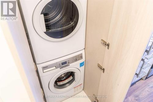 706 - 28 Wellesley Street E, Toronto, ON - Indoor Photo Showing Laundry Room