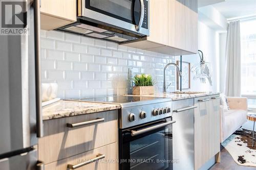 706 - 28 Wellesley Street E, Toronto (Church-Yonge Corridor), ON - Indoor Photo Showing Kitchen With Stainless Steel Kitchen With Upgraded Kitchen