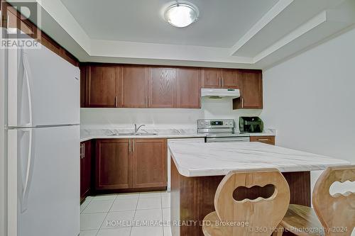 21 - 1 Eaton Park Lane, Toronto (L'Amoreaux), ON - Indoor Photo Showing Kitchen