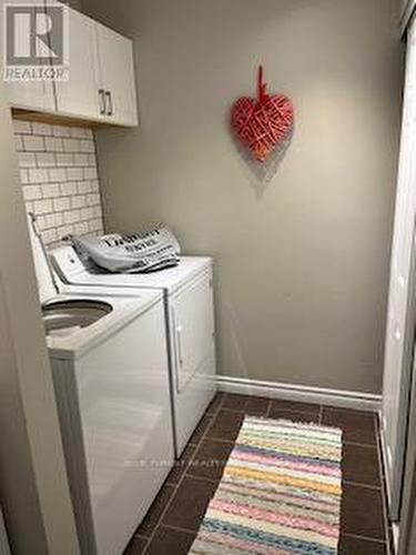 Ensuite Laundry with full-sized machines - 103 - 1096 Jalna Boulevard, London, ON - Indoor Photo Showing Laundry Room