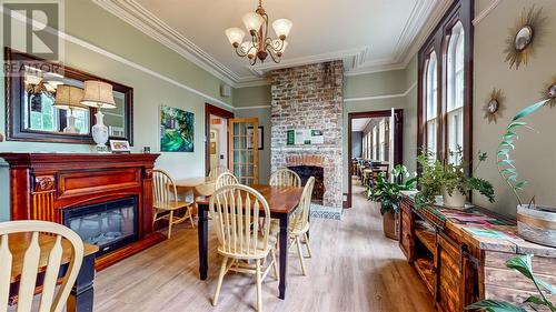 93 Station Road, Brigus, NL - Indoor Photo Showing Dining Room With Fireplace