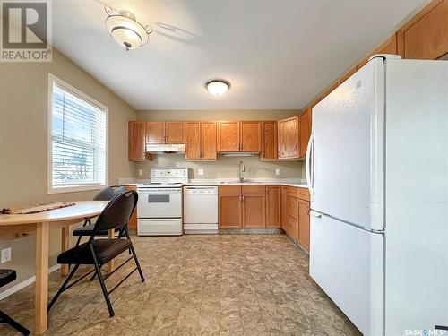 1139 M Avenue S, Saskatoon, SK - Indoor Photo Showing Kitchen With Double Sink