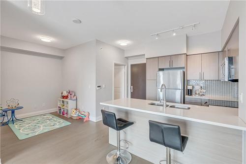 55 Speers Road|Unit #1106, Oakville, ON - Indoor Photo Showing Kitchen With Double Sink