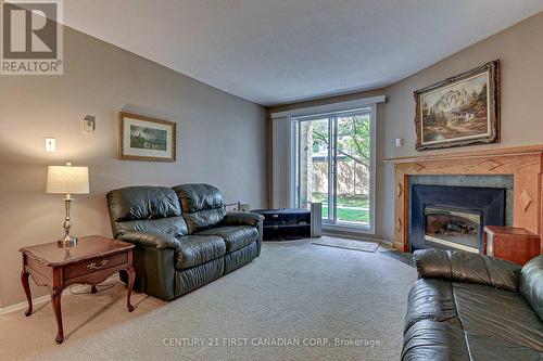 112 - 733 Deveron Crescent, London, ON - Indoor Photo Showing Living Room With Fireplace