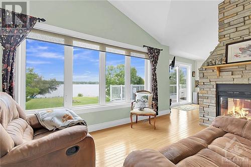 3695 Front Road, Hawkesbury, ON - Indoor Photo Showing Living Room With Fireplace