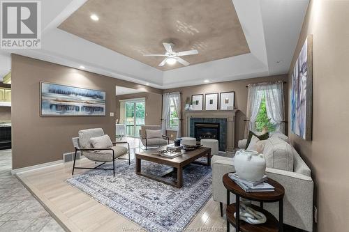 161 Pheasant Run, Lakeshore, ON - Indoor Photo Showing Living Room With Fireplace