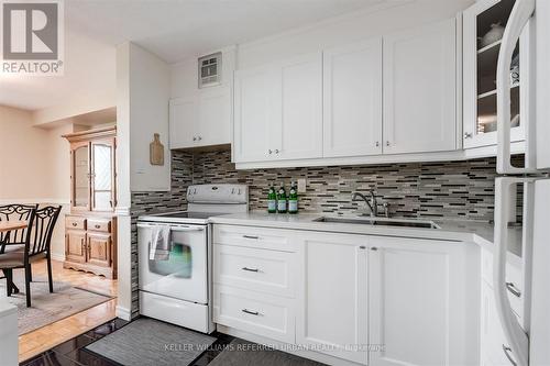 410 - 541 Blackthorn Avenue, Toronto (Keelesdale-Eglinton West), ON - Indoor Photo Showing Kitchen With Double Sink